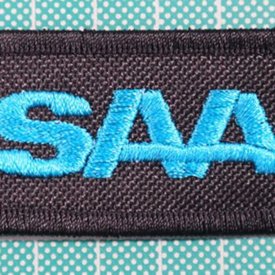 Fabric keychain Truck with embroidered logo 12x3 cm new, black