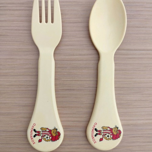 Thrileon baby spoon and fork with Olympiakos mascot, lightly used