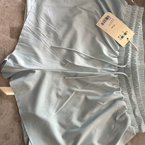 My Protein double sports shorts with inner pockets, turquoise, size M