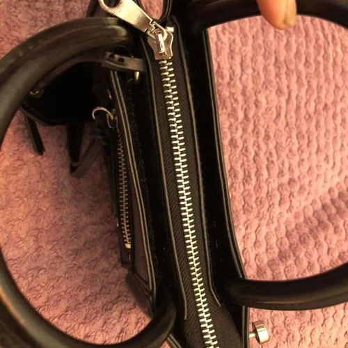H&M mini black leather handbag new with rock details
