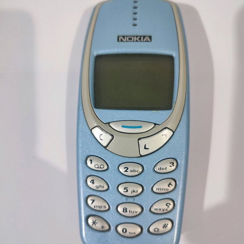 Nokia 3310 Classic Phone turquoise used with charger