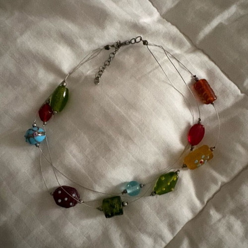 Necklace used with colorful designs and plexiglass shapes