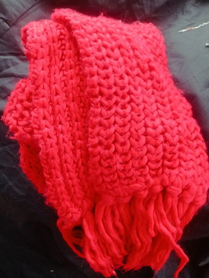 Knitted scarf used, handmade red with fringes