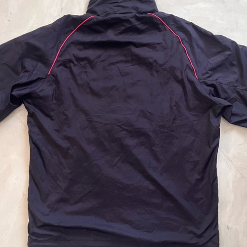 Puma women's windbreaker jacket like new, size L, multicolor