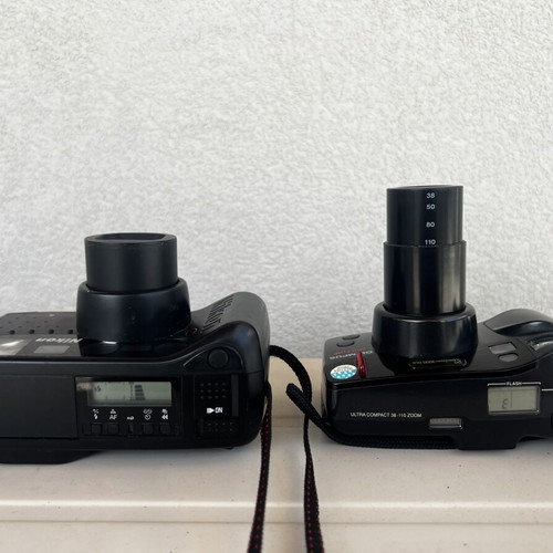 Olympus Super Zoom and Nikon Zoom Touch 600 cameras used