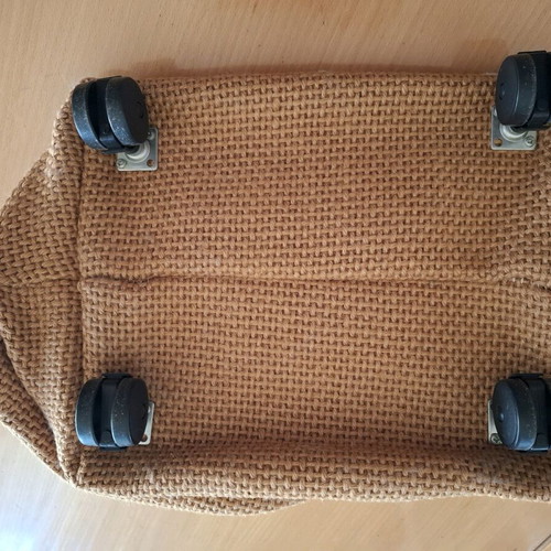 Woven magazine holder with wheels used