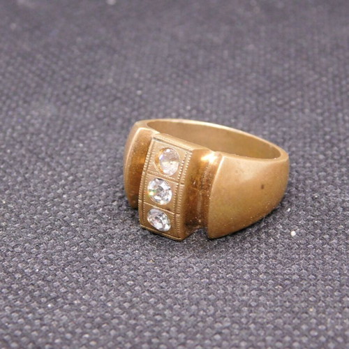Brass ring with 3 zircon stones