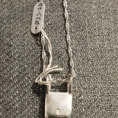 Silver women's necklace with minimal geometric pendant