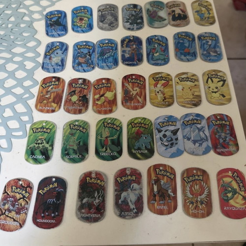 Pokemon metal tags 2006 like new