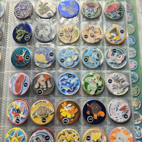 Pokemon collectible caps 213 pieces like new