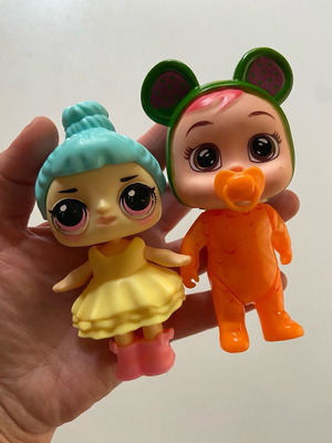 Collectible mini dolls used, Cry Doll and Lol Doll