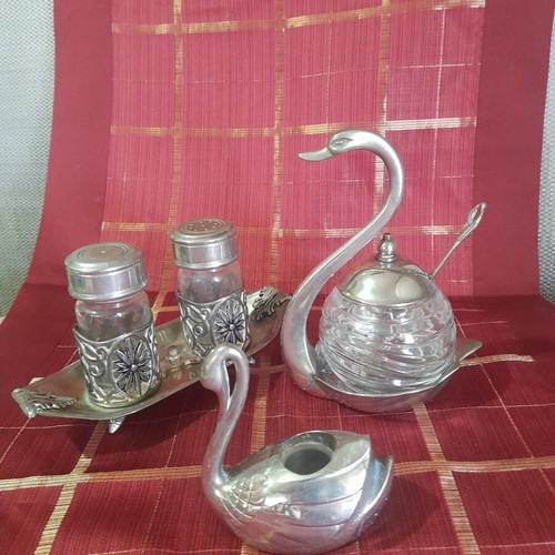 Vintage silver-plated swan decoration set used