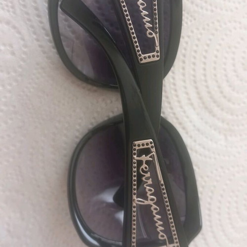 Salvatore Ferragamo sunglasses black like new with zirconia