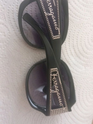 Salvatore Ferragamo sunglasses black like new with zirconia