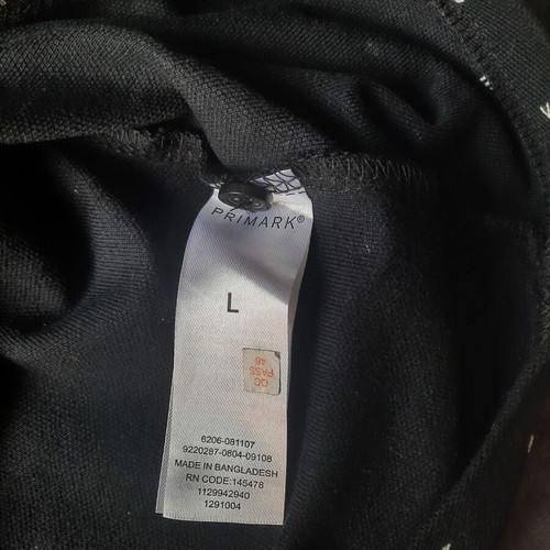 Polo T-Shirt Primark with symbol pattern like new, size L