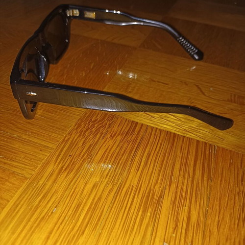Epos sunglasses new with leather case, black lenses