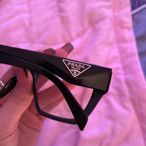 Prada eyeglasses black used with replaceable lenses