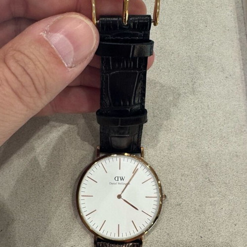 Daniel Wellington watch 40mm used with black handmade leather strap
