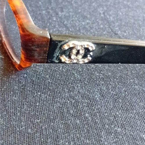 Chanel protective glasses with missing stones
