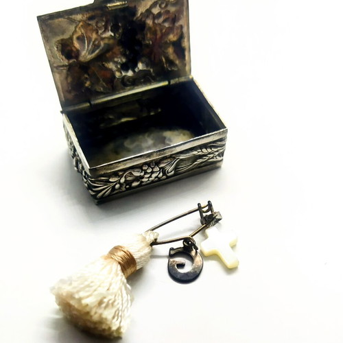 Old silver-plated pill box with embossed decoration like new