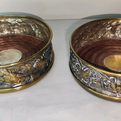 Wine Coasters used, silver metal with wooden base, repoussé grape motif