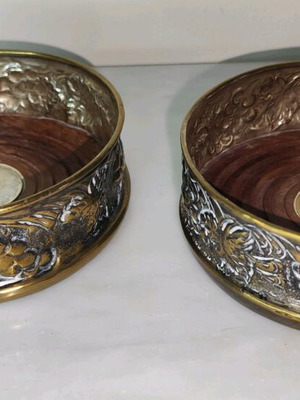 Wine Coasters used, silver metal with wooden base, repoussé grape motif
