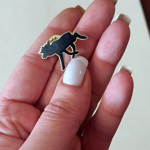 Black reindeer pin, gold tone