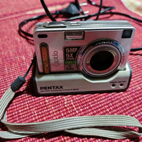 Pentax Optio SVi digital camera used with case and charger