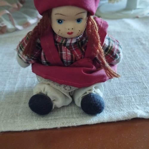 Vintage porcelain doll like new