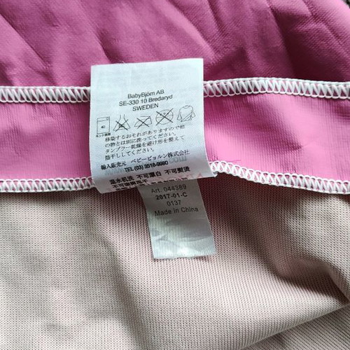 Babybjorn smock used for feeding or play pink fuchsia
