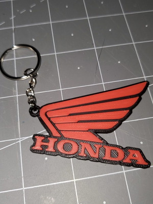 Honda keychain like new, black and red