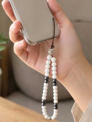 Handmade mobile wrist strap with white mineral glass and hematite ZP-005