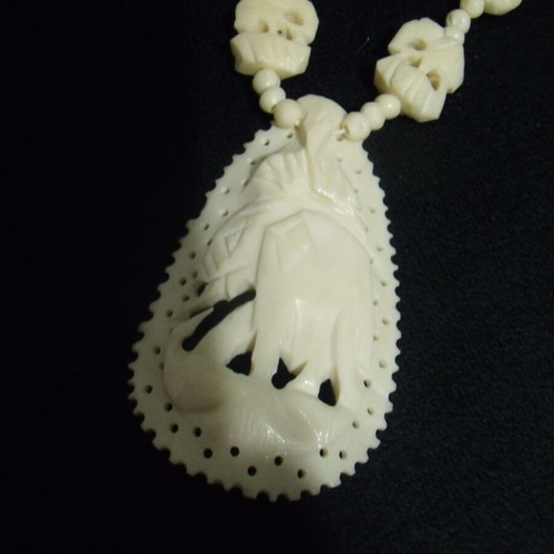 Old jewelry necklace used with white ornaments