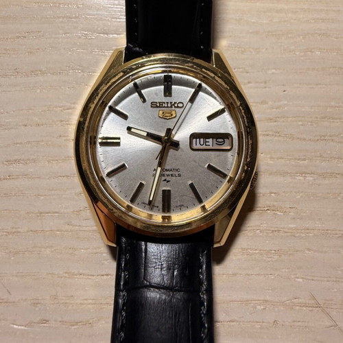 Seiko Sport 5 watch used with black leather strap and daydate