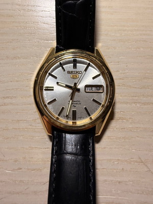 Seiko Sport 5 watch used with black leather strap and daydate
