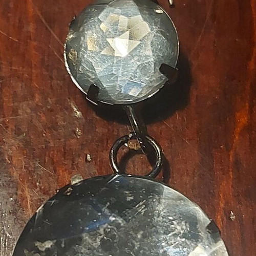 Earring used with white and silver plastic stones