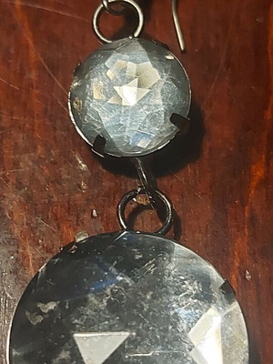 Earring used with white and silver plastic stones