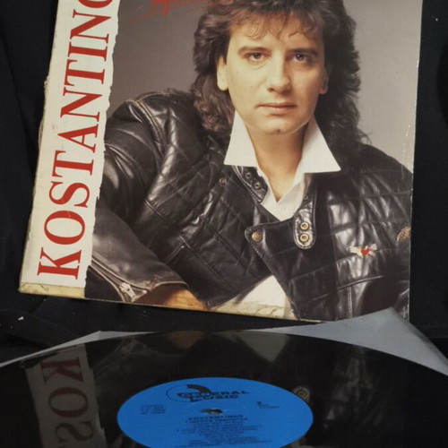 Kostantinos vinyl record used with tape on cover x2