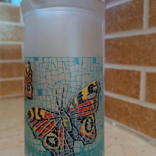 Glass pitcher with butterfly design like new