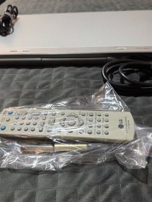 DVD player LG μεταχειρισμένο με τηλεχειριστήριο και καλώδιο scart