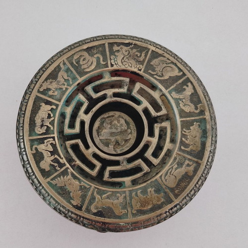 Metal incense burner used with decorative elements from the Chinese zodiac