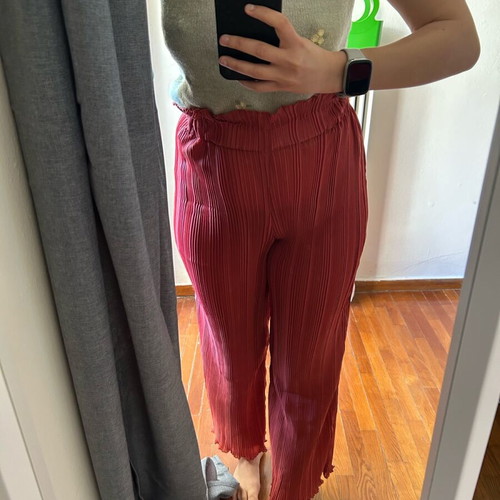 Red pants size M like new made of white fabric
