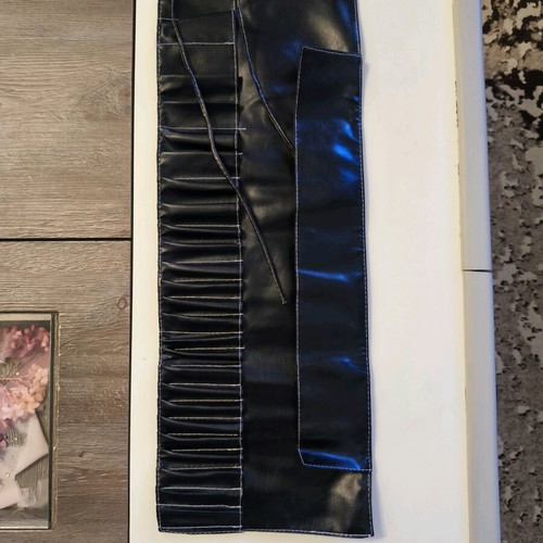 Makeup brush holder like new, black synthetic leather
