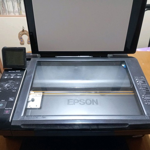Epson Stylus SX415 multifunction printer used for repair or parts