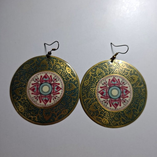 Dangling earrings used with designs, gold-colored