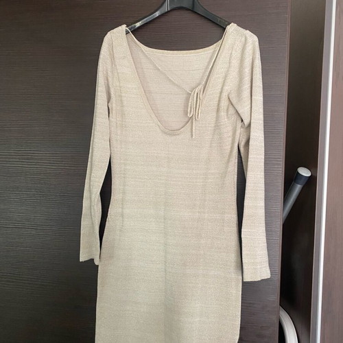Gold lurex dress used with open back and tie detail