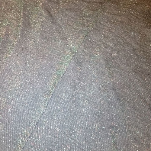 Glitter pants used, green and gold, with small hole