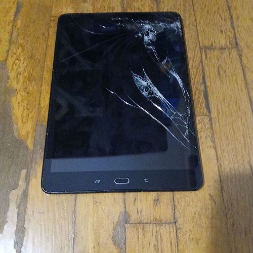 Samsung Galaxy Tab A 9.7 SM-T555 tablet with broken screen for parts