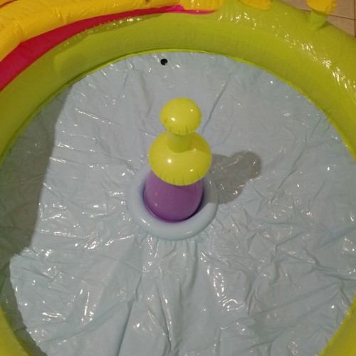 Inflatable colorful playpen used with balls and slides