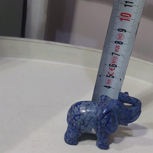Decorative elephant carved from natural blue stone like new